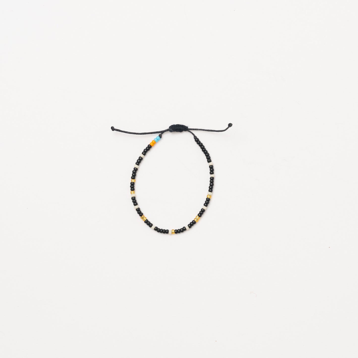 Single Strand Bracelet - Black/Gold/White