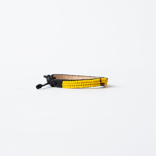 FINAL SALE: Skinny LOVE Bracelet - Yellow/Bronze lifestyle image