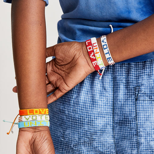 FINAL SALE: Woven VOTE Bracelet - White/Green lifestyle image