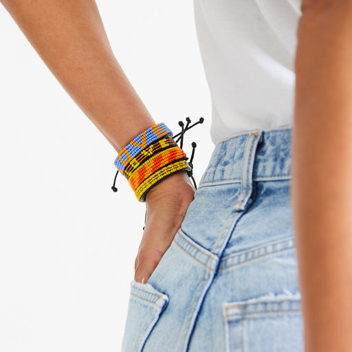 SAMPLE SALE: Skinny Msalaba Bracelet - Yellow/Gold lifestyle image