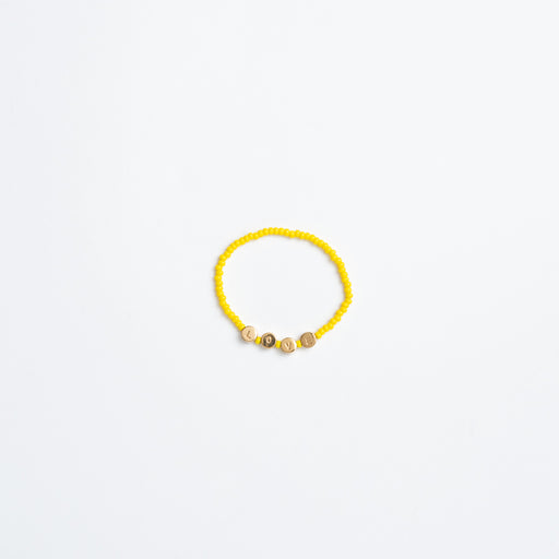 FINAL SALE: Elastic Bracelet with Round Brass LOVE Beads - Marigold