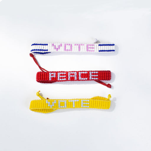 FINAL SALE: Woven VOTE Bracelet - White/Purple lifestyle image
