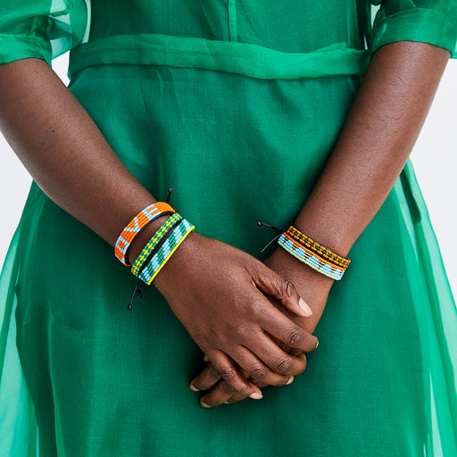 SAMPLE SALE: Skinny Msalaba Bracelet - Orange/Green lifestyle image